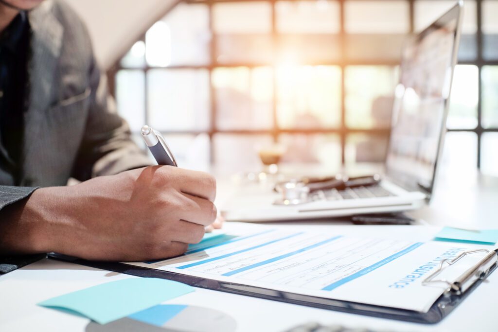 Charlotte remote worker, reviewing a denied workers' comp claim at home.
