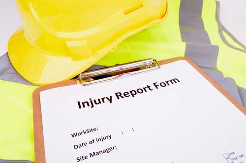 Workplace injuries reporting form and hard hat